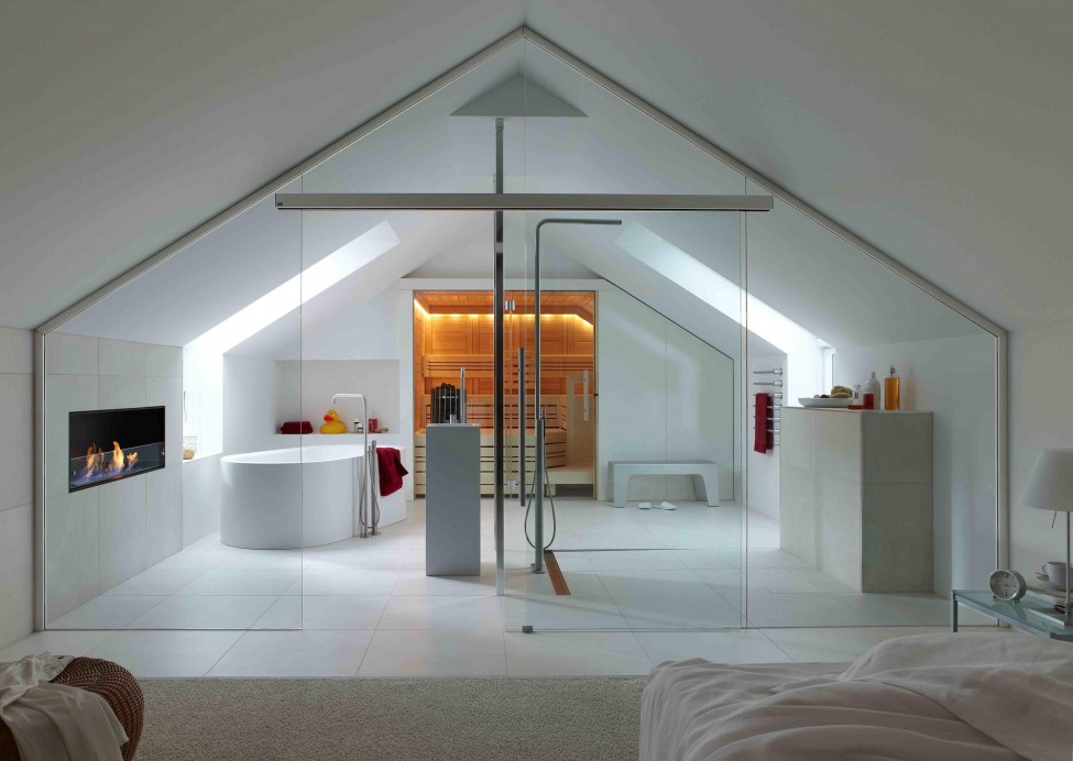 Amusing-attic-bathroom-decoration-ideas-with-double-glass-window-set-on-sloping-ceiling-also-bathtub-beside-modern-fireplace-and-towels-rack-beside-window-975x692