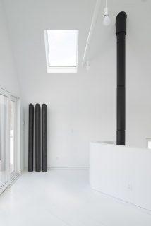 living con termosifone e camino